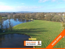 TERRAIN CONSTRUCTIBLE AVEC 2 ETANGS + PRAIRIE - 4.1Ha