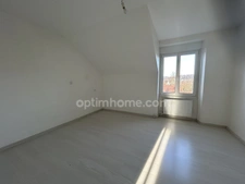 HIRSINGUE, jolie maison mitoyenne, 61m², 2chambres, sous-sol, jardin privatif, grand garage, pompe à chaleur, aucun travaux.