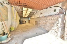 Maison de ville avec garage, jardin et fort potentiel – À deux pas de la gare et du centre-ville de Conches-en-Ouche
