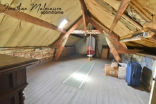 Maison de ville avec garage, jardin et fort potentiel – À deux pas de la gare et du centre-ville de Conches-en-Ouche