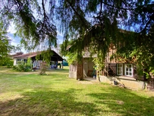 MAISON A COLOMBAGES RENOVEE AVEC GITE INDEPENDANT SUR 2700 M2 DE TERRAIN A LACQUY.