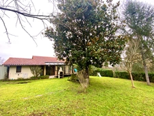 Maison de charme 5 pièces avec garage et véranda fermée à GAMARDE LES BAINS (40) sur terrain de 1200 M2 sans vis à vis