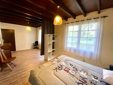 MAISON A COLOMBAGES RENOVEE AVEC GITE INDEPENDANT SUR 2700 M2 DE TERRAIN A LACQUY.