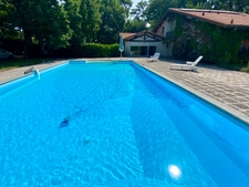Maison Landaise de 280M2 avec piscine et grand terrain divisible boisé de chênes à SAINT PIERRE DU MONT (40)