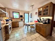 Maison 4 chambres + garage + beau jardin