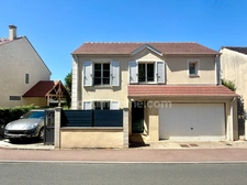 Maison 4 chambres + double garage + parking