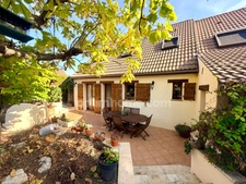 Maison 4 chambres + garage + beau jardin