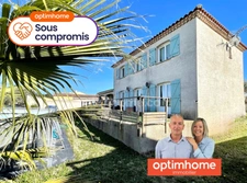 Maison familiale 128 m² avec double garage et jardin à Saint-Laurent-d'Aigouze