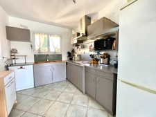 Maison familiale 128 m² avec double garage et jardin à Saint-Laurent-d'Aigouze