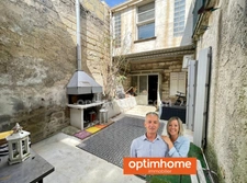 MAISON DE VILLAGE TRAVERSANTE AVEC PATIO ET GRAND GARAGE