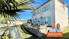 Maison familiale 128 m² avec double garage et jardin à Saint-Laurent-d'Aigouze