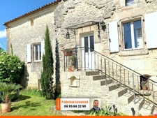 Propriété comprenant une maison charentaise de 230 m², attenant un gîte de 79 m² indépendant et un studio l’ensemble meublé. SAINT SATURNIN (16)