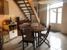 Maison de bourg de 113 m2  avec garage et jardinet et local commercial 