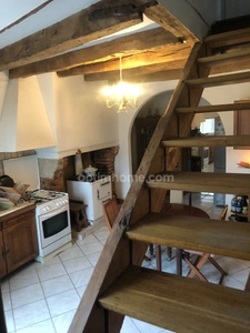 Maison de bourg de 113 m2  avec garage et jardinet et local commercial 