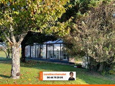 Maison individuelle de plain-pied sur sous sol avec jardin de 1680m2.