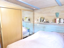 Chalet 2 pièces de plain pied avec véranda-salon 53m²