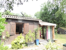 Chalet 2 pièces de plain pied avec véranda-salon 53m²