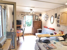 Chalet 2 pièces de plain pied avec véranda-salon 53m²