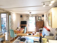 Chalet 2 pièces de plain pied avec véranda-salon 53m²