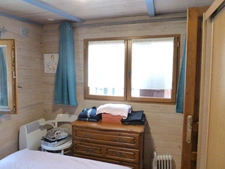 Chalet 2 pièces de plain pied avec véranda-salon 53m²