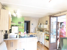 Chalet 2 pièces de plain pied avec véranda-salon 53m²