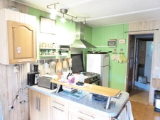 Chalet 2 pièces de plain pied avec véranda-salon 53m²