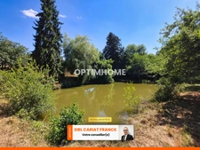 MAISON EN PIERRE DE SEMI PLAIN-PIED DE 86 M2, L’ENSEMBLE SUR 4560 M² DE TERRAIN CLOS AVEC DES DÉPENDANCES >