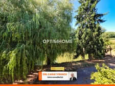 MAISON EN PIERRE DE SEMI PLAIN-PIED DE 86 M2, L’ENSEMBLE SUR 4560 M² DE TERRAIN CLOS AVEC DES DÉPENDANCES >