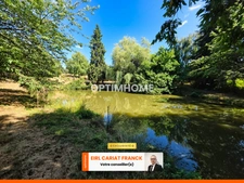 MAISON EN PIERRE DE SEMI PLAIN-PIED DE 86 M2, L’ENSEMBLE SUR 4560 M² DE TERRAIN CLOS AVEC DES DÉPENDANCES >