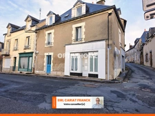  Immeuble de 124 m² avec 4 appartements sur 93 m² de terrain