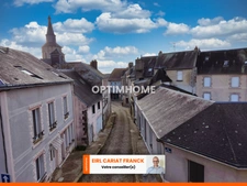  Immeuble de 124 m² avec 4 appartements sur 93 m² de terrain