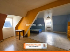  Immeuble de 124 m² avec 4 appartements sur 93 m² de terrain