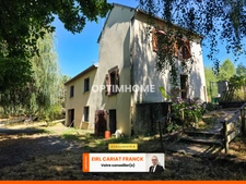MAISON EN PIERRE DE SEMI PLAIN-PIED DE 86 M2, L’ENSEMBLE SUR 4560 M² DE TERRAIN CLOS AVEC DES DÉPENDANCES >