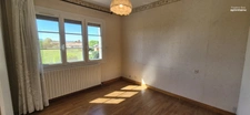 Maison avec grands volumes et fort potentiel sur Grièges – Terrain de plus de 4 000 m²