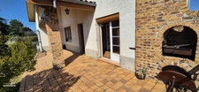 Maison avec grands volumes et fort potentiel sur Grièges – Terrain de plus de 4 000 m²