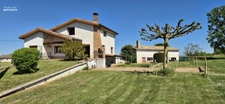 Maison avec grands volumes et fort potentiel sur Grièges – Terrain de plus de 4 000 m²