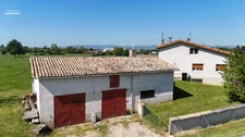 Maison avec grands volumes et fort potentiel sur Grièges – Terrain de plus de 4 000 m²