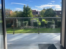 Appartement 74 m² avec garage, stationnement et balcon
