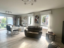 Appartement 74 m² avec garage, stationnement et balcon