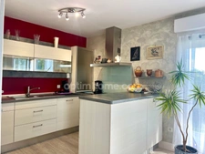 Appartement 74 m² avec garage, stationnement et balcon