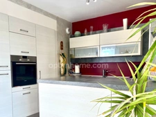 Appartement 74 m² avec garage, stationnement et balcon
