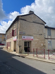 Au cœur du village de Marthon, Bâtiment en pierres, ancien commerce, bar pizza,  avec logement au dessus 