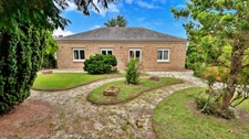 Maison plain-pied de 165 m2 sur 1100 m2 de terrain clos à St Hilaire des Landes (35)