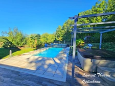 Maison plain-pied 5 pièces 3 chambres avec piscine chauffée sur terrain de 3 ha