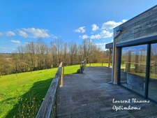 Maison ossature bois plain-pied 120 m² 5 pièces 3 ch au calme 