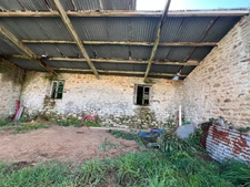 Tourch (proche Rosporden) : Terrain 830 m2 avec bâtisses en pierre et Mobil-home 