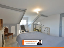 Maison 97 m² avec 4 chambres, grand terrain et garage indépendant