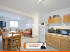 Maison 97 m² avec 4 chambres, grand terrain et garage indépendant