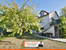 Maison 97 m² avec 4 chambres, grand terrain et garage indépendant