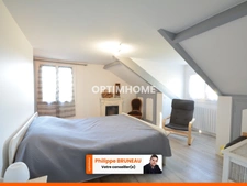 Maison 97 m² avec 4 chambres, grand terrain et garage indépendant